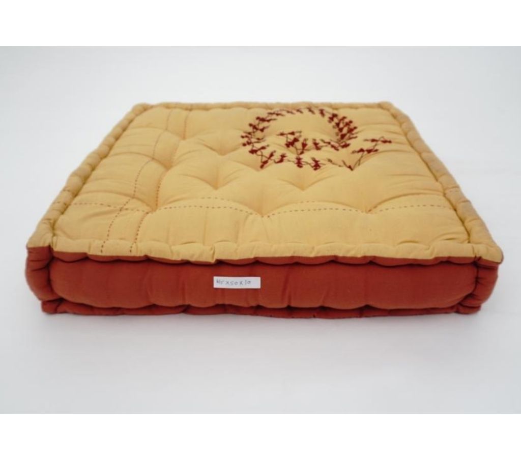 Close-up of hand block print on organic cotton floor cushion | Myyra Jaipur