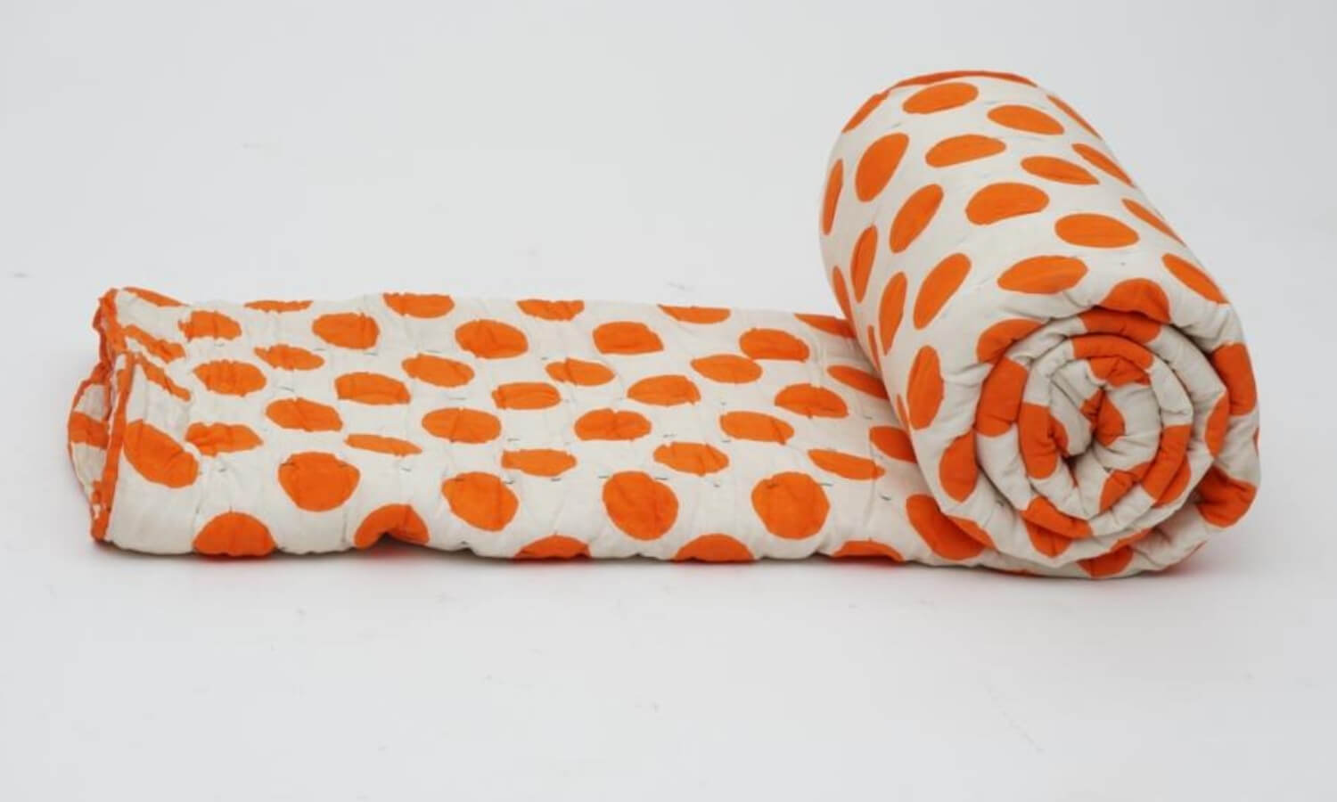 Close-up of hand block print on organic cotton quilt | Myyra Jaipur