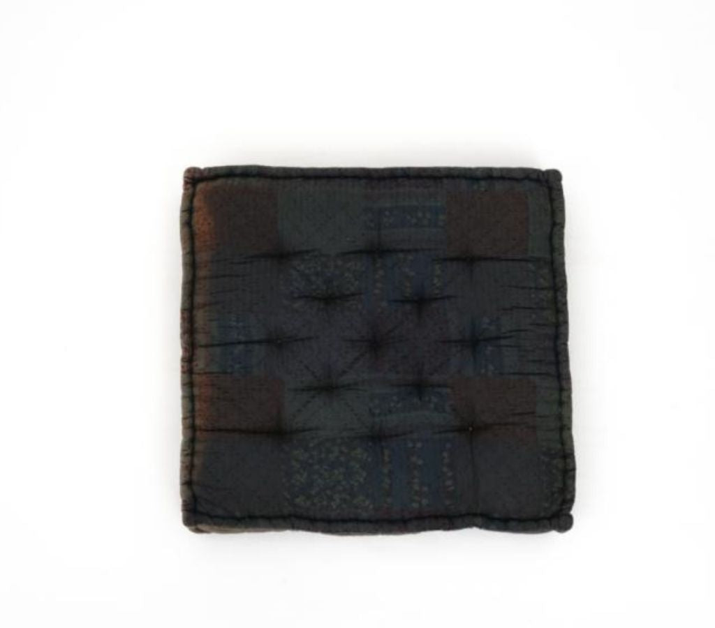 Floor cushion styled view from Myyra Jaipur
