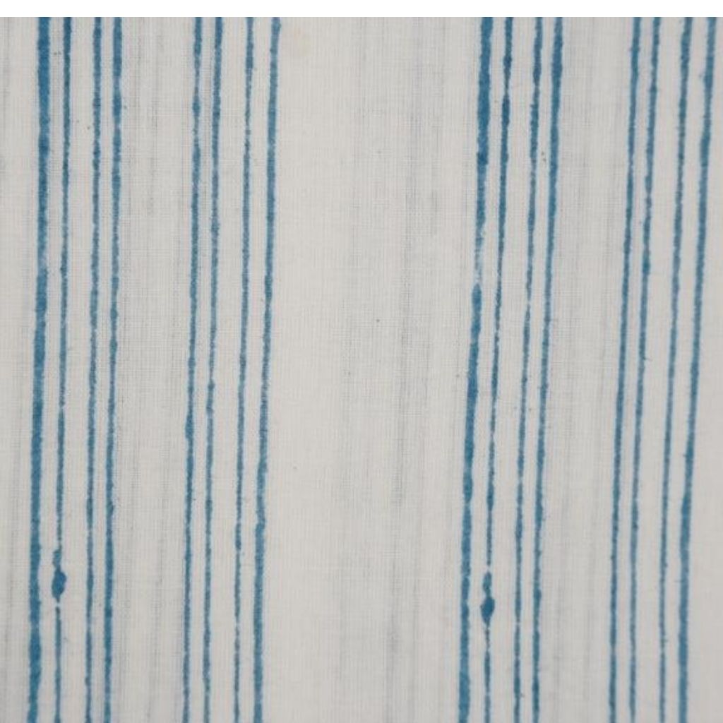 Close-up of hand block print on organic cotton running fabric | Myyra Jaipur