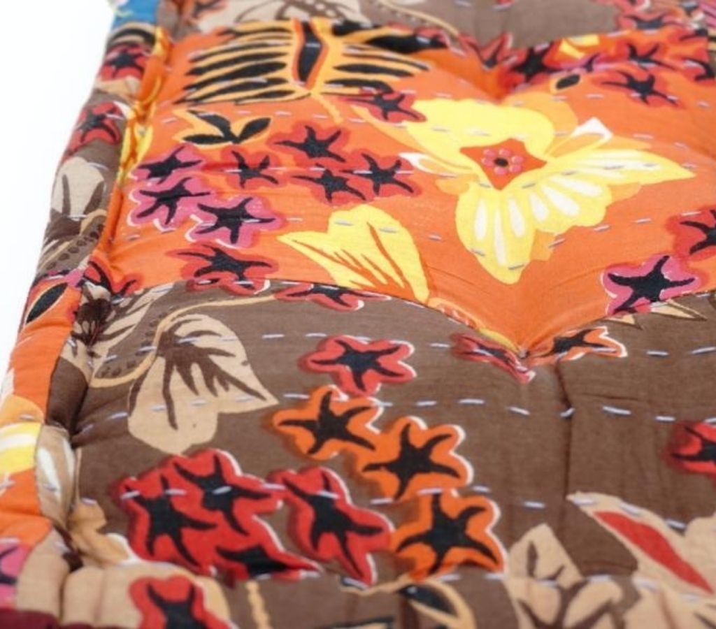 Close-up of hand block print on organic cotton floor cushion | Myyra Jaipur