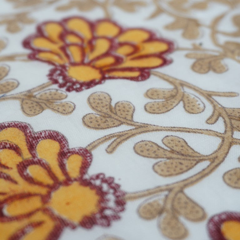 Close-up of hand block print on organic cotton running fabric | Myyra Jaipur