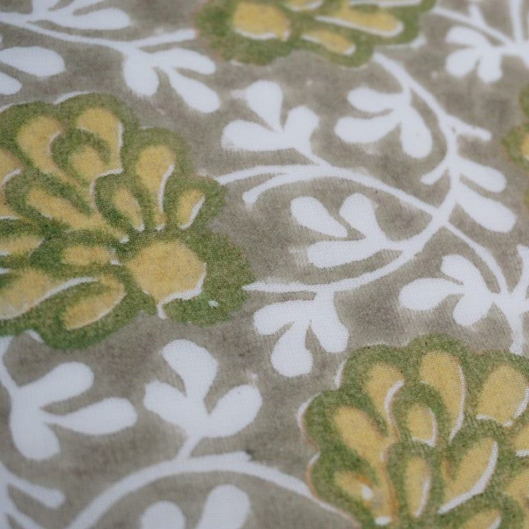 Close-up of hand block print on organic cotton running fabric | Myyra Jaipur