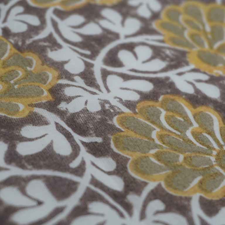 Close-up of hand block print on organic cotton running fabric | Myyra Jaipur