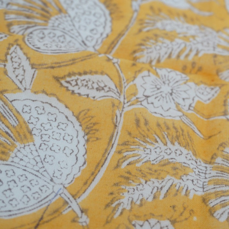 Close-up of hand block print on organic cotton running fabric | Myyra Jaipur