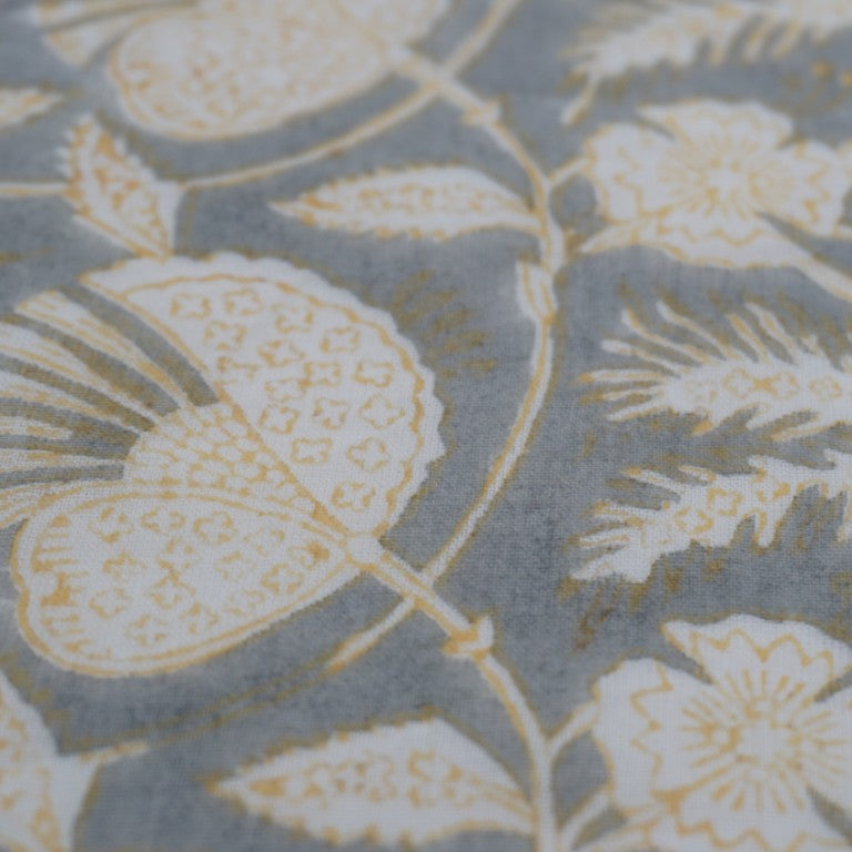 Close-up of hand block print on organic cotton running fabric | Myyra Jaipur