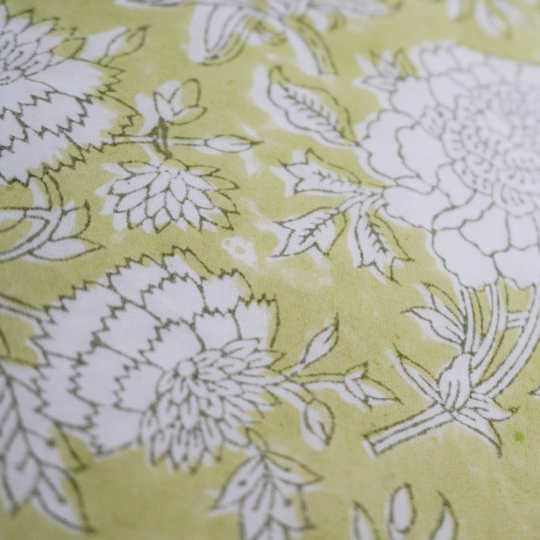 Close-up of hand block print on organic cotton running fabric | Myyra Jaipur