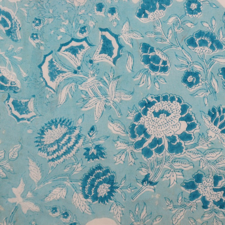 Close-up of hand block print on organic cotton running fabric | Myyra Jaipur