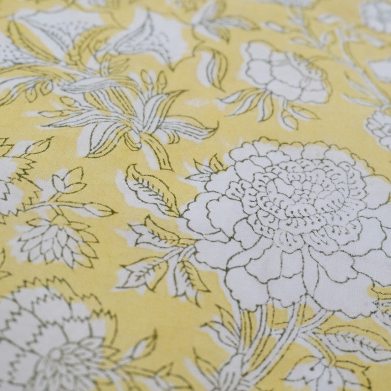 Close-up of hand block print on organic cotton running fabric | Myyra Jaipur