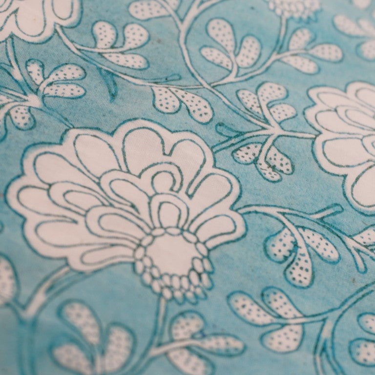 Close-up of hand block print on organic cotton running fabric | Myyra Jaipur