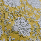 Close-up of hand block print on organic cotton running fabric | Myyra Jaipur