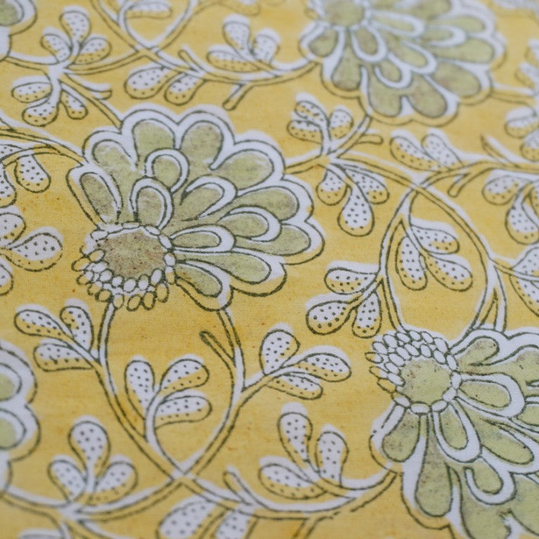 Close-up of hand block print on organic cotton running fabric | Myyra Jaipur