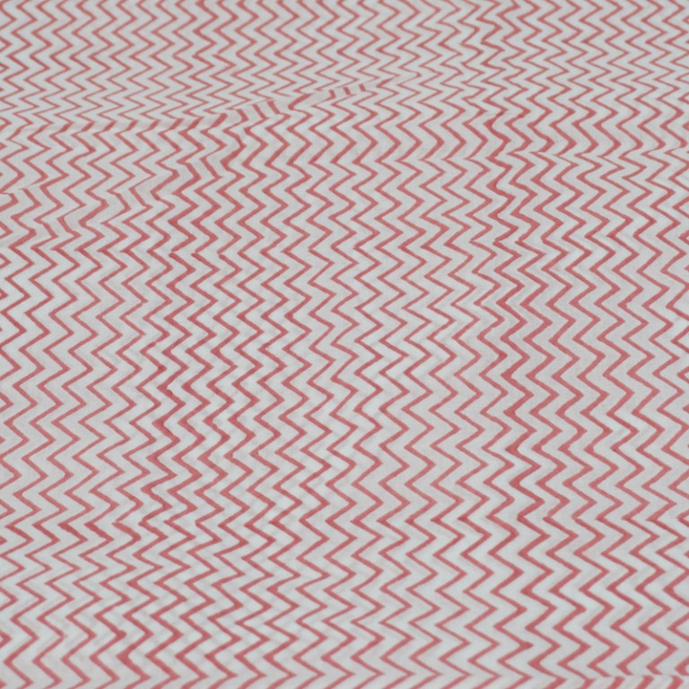 Close-up of hand block print on organic cotton running fabric | Myyra Jaipur