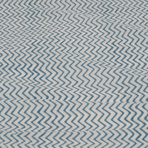 Close-up of hand block print on organic cotton fabric by the yard | Myyra Jaipur