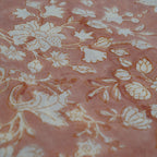 Folded hand block printed organic cotton yardage showing pattern repeat | Myyra Jaipur