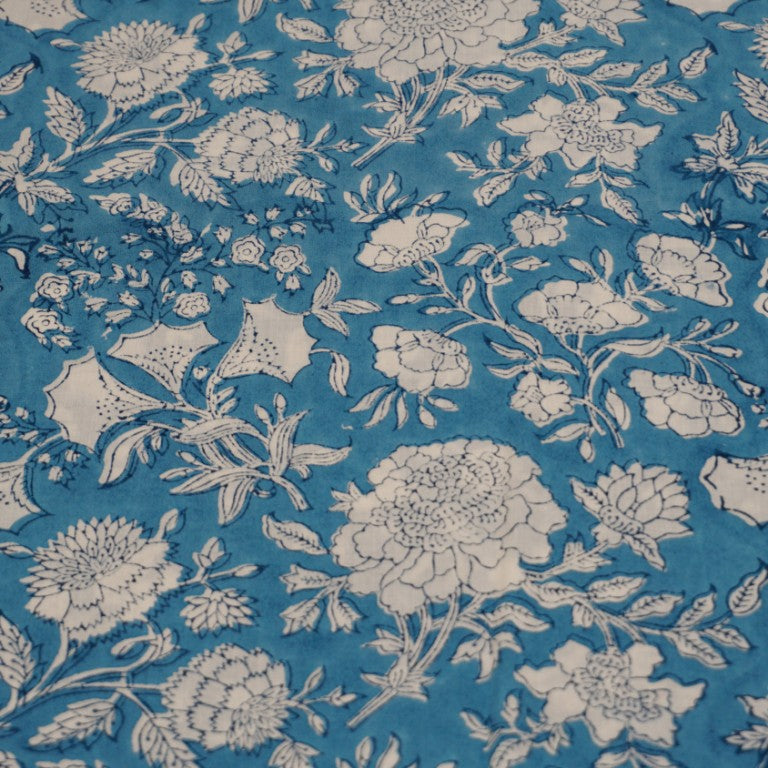 Close-up of hand block print on organic cotton running fabric | Myyra Jaipur