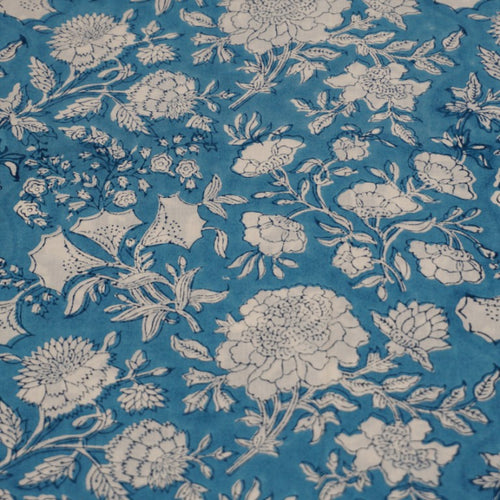 Close-up of hand block print on organic cotton running fabric | Myyra Jaipur