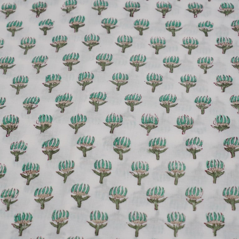 Close-up of hand block print on organic cotton running fabric | Myyra Jaipur