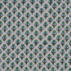 Folded hand block printed organic cotton yardage showing pattern repeat | Myyra Jaipur