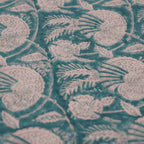 Folded hand block printed organic cotton yardage showing pattern repeat | Myyra Jaipur