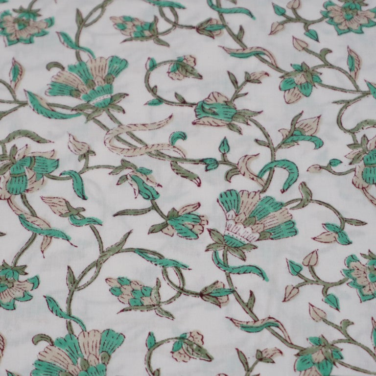 Close-up of hand block print on organic cotton running fabric | Myyra Jaipur
