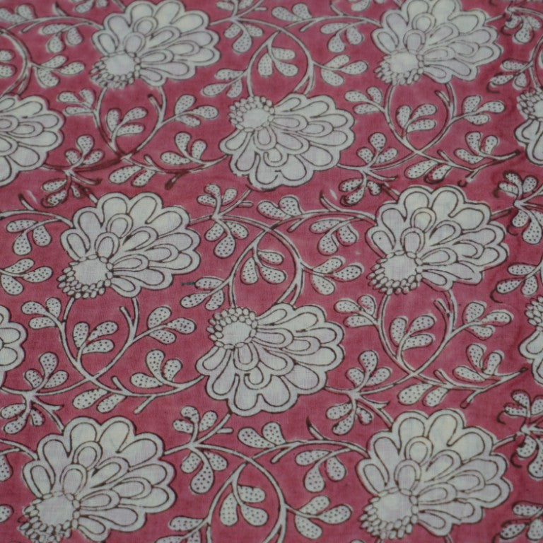Close-up of hand block print on organic cotton running fabric | Myyra Jaipur