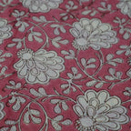 Folded hand block printed organic cotton yardage showing pattern repeat | Myyra Jaipur