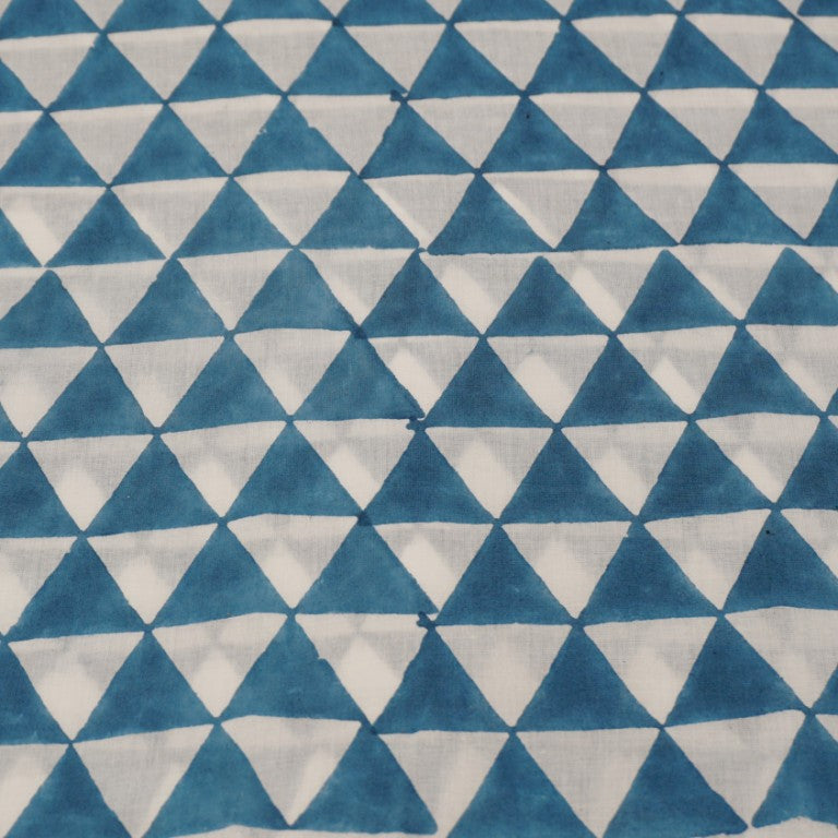 Close-up of hand block print on organic cotton running fabric | Myyra Jaipur