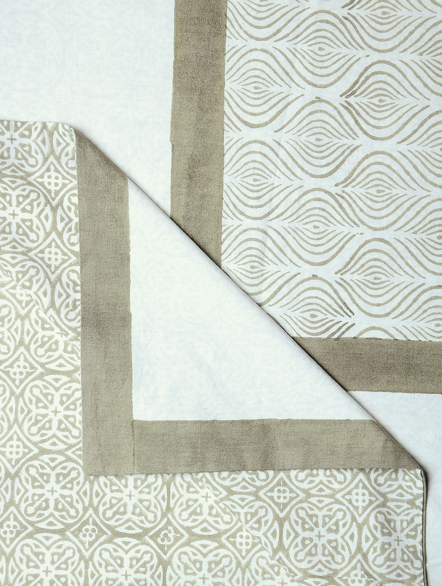Close-up of white hand block print on organic cotton bed cover | Myyra Jaipur