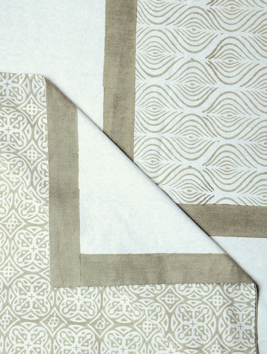Close-up of white hand block print on organic cotton bed sheet | Myyra Jaipur
