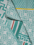 Close-up of white and green hand block print on organic cotton bed sheet | Myyra Jaipur