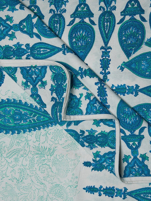 Close-up of blue, green and white hand block print on cotton bed sheet | Myyra Jaipur