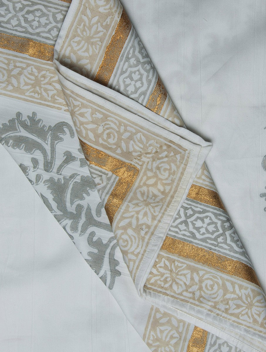 Close-up of grey, beige and white hand block print on organic cotton bed cover | Myyra Jaipur