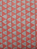 Close-up of red and grey hand block print on organic cotton pillow cover | Myyra Jaipur