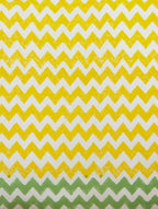 Close-up of yellow, white and green hand block print on organic cotton pillow cover | Myyra Jaipur