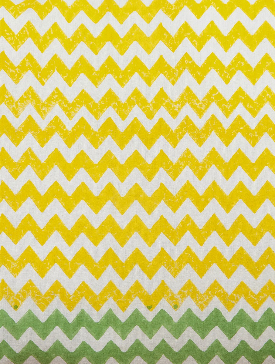 Close-up of yellow, white and green hand block print on organic cotton pillow cover | Myyra Jaipur