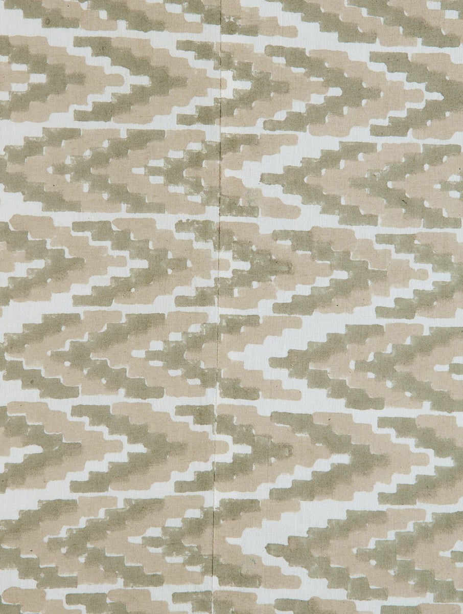 Close-up of ikat hand block print on organic cotton cushion cover | Myyra Jaipur