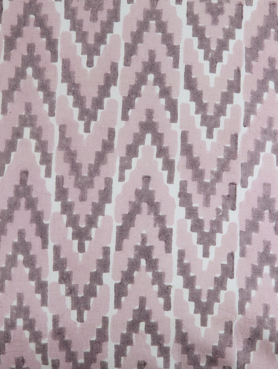 Close-up of ikat hand block print on organic cotton cushion cover | Myyra Jaipur