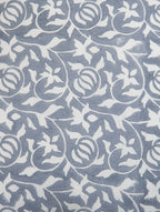 Close-up of grey hand block print on organic cotton cushion cover | Myyra Jaipur
