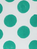 Close-up of polka dot hand block print on organic cotton cushion cover | Myyra Jaipur