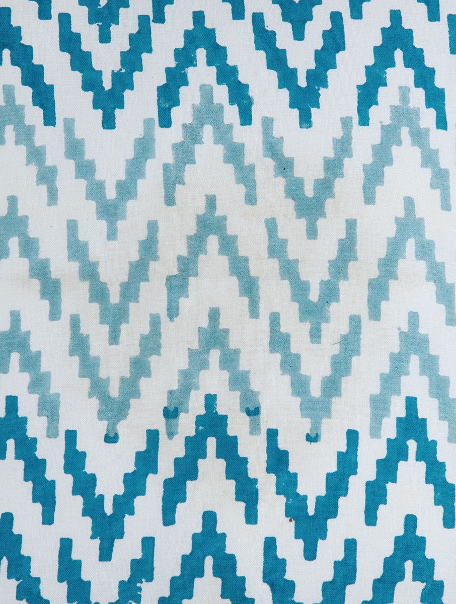Close-up of ikat hand block print on organic cotton cushion cover | Myyra Jaipur