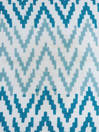 Close-up of ikat hand block print on organic cotton cushion cover | Myyra Jaipur