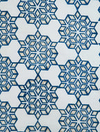 Close-up of geometric hand block print on organic cotton cushion cover | Myyra Jaipur
