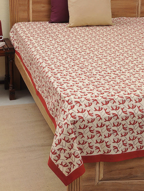 Red hand block printed organic cotton bed cover with flower pattern | Myyra Jaipur