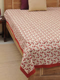 Hand block printed organic cotton bed sheet with red floral jaal pattern | Myyra Jaipur