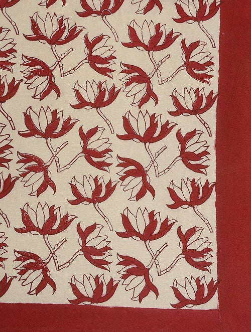 Close-up of red floral jaal hand block print on organic cotton bed sheet | Myyra Jaipur