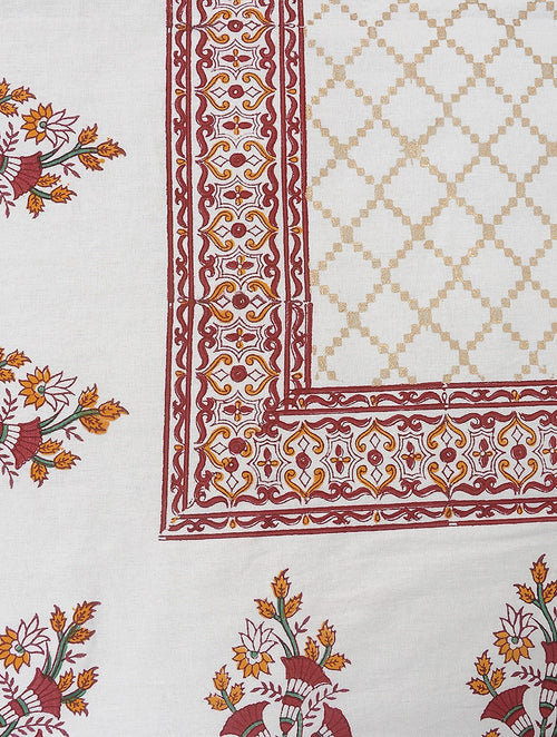 Close-up of maroon and gold hand block print on organic cotton bed cover | Myyra Jaipur