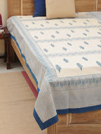 Blue hand block printed organic cotton bed cover with leaf motif pattern | Myyra Jaipur
