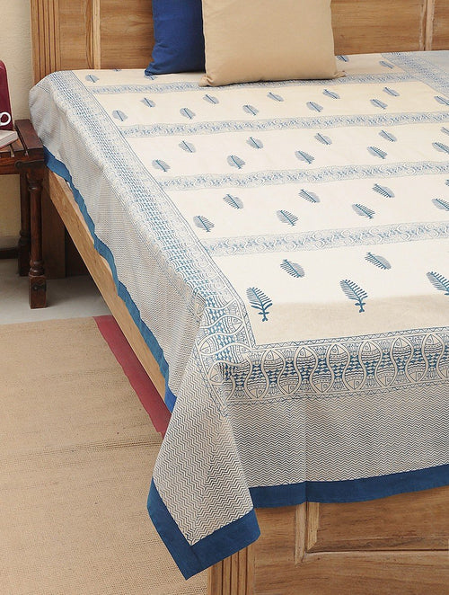 Hand block printed organic cotton bed sheet with blue leaf and fish motif | Myyra Jaipur