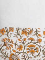 Close-up of floral hand block print on organic cotton cushion cover | Myyra Jaipur